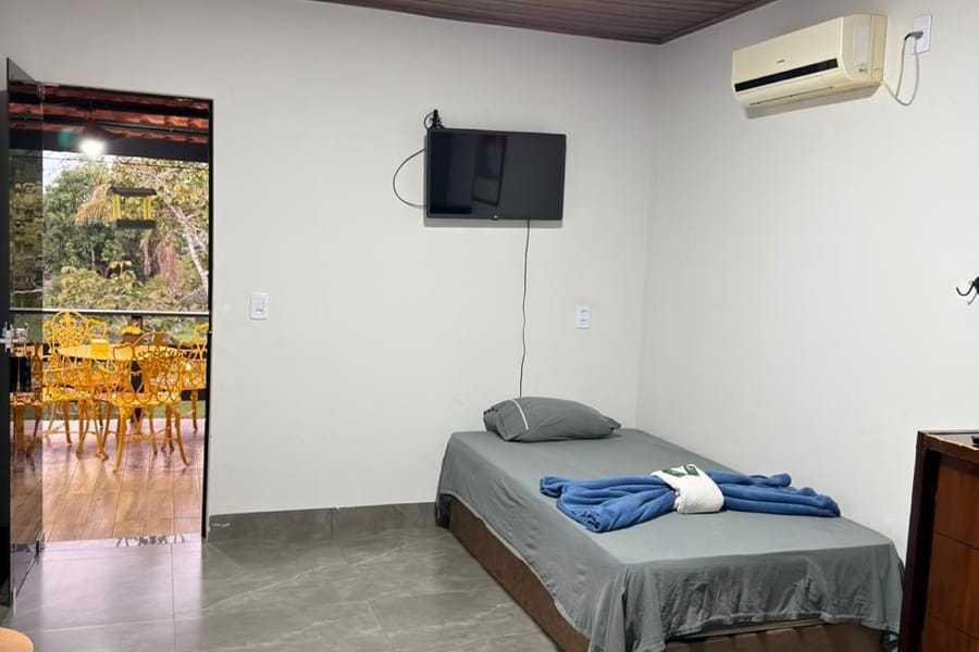 Quarto do Apartamento Sobrado 1 com cama de casal e cama de solteiro